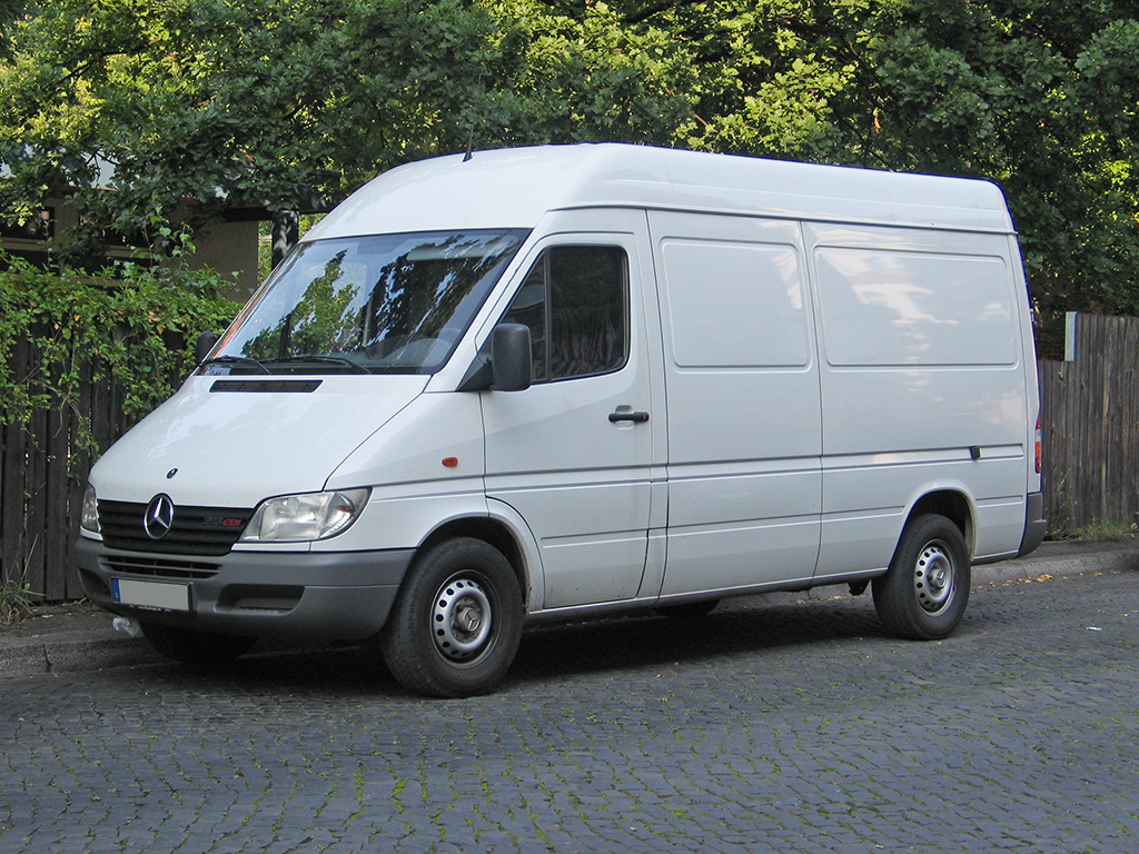 men in white vans