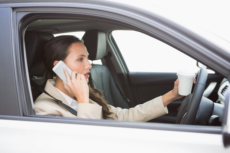 Police on an anonymous HGV catches distracted driversher car