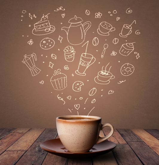 Steaming hot drink decorated with doodle drawings