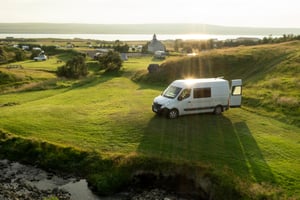 Van in green lands