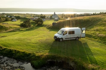 Van in green lands